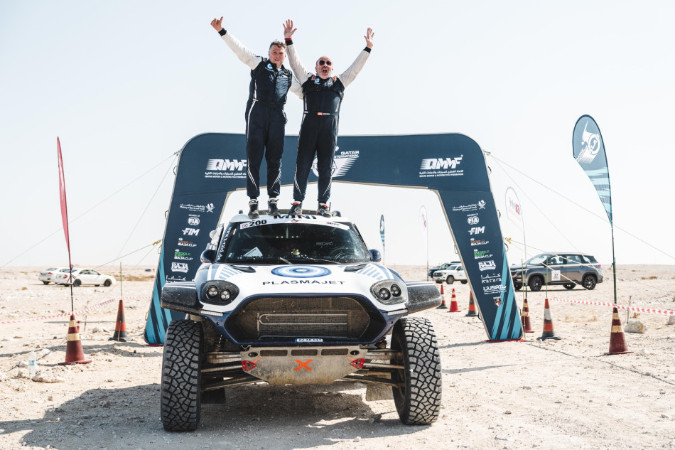 Denis Krotov and Konstantin Zhiltsov celebrate their win in Qatar